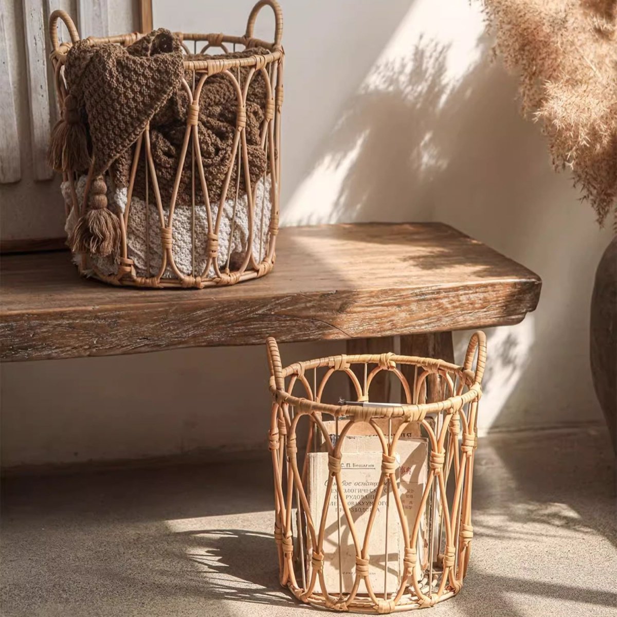 Woven baskets on a wooden surface with a neutral background